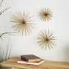 Deco 79 Metal Starburst Long Spike Wall Decor, Set of 3, 6", 9", 12"W, Gold